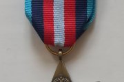 Медаль «Арктическая звезда» на ленте. Размер: 4х4 см Литье, металл, лента репсовая. Великобритания, 2012 г.