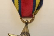 Медаль «Бирманская звезда». Размер: 4,2х3,7 см, лента 5,5х3,3 см. Металл, лента репсовая. Великобритания