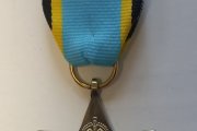 Медаль «Звезда летных экипажей Европы» на ленте. Размер: 4,2х3,7 см, лента 5,5х3,3 см. Металл, лента репсовая. Великобритания