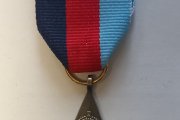 Медаль «Звезда 1939-1945» на ленте. Размер: 4,2х3,7 см, лента 5,5х3,3 см. Металл, лента репсовая. Великобритания